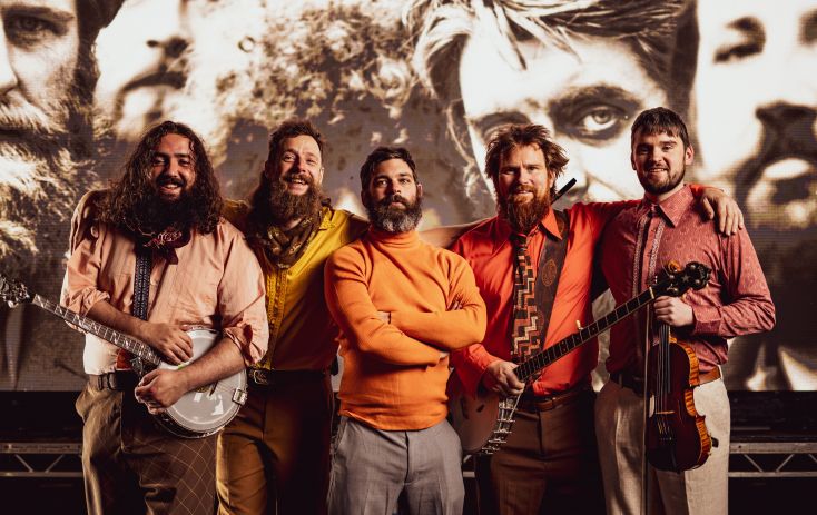 The Dubliners look at the camera